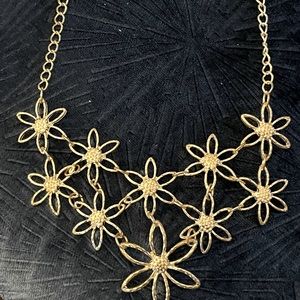 Silver Daisy statement necklace.